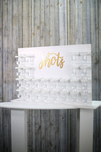 Load image into Gallery viewer, Shots Wall White With Acrylic Golds Shots Text 70x55cm. Holds 24 Shots. Freestanding